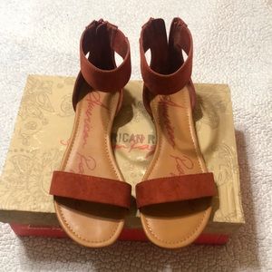 Brand new sandals with zipper in back